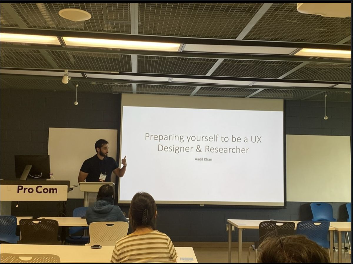 Aadil presenting a talk on preparing to be a UX designer and researcher